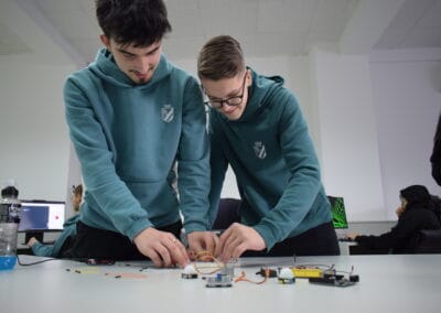 Secondary students at Richmond Park Sarajevo collaborating on a STEM project in a modern ICT lab.